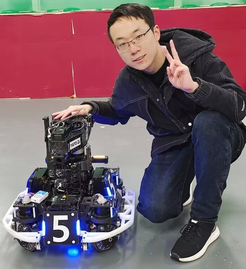 Being with one of the robots for RoboMaster Competition, 2023
